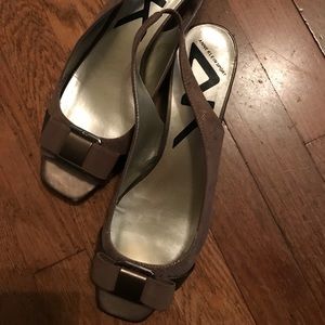 Anne Klein Sport low heal snake-skin print shoe.